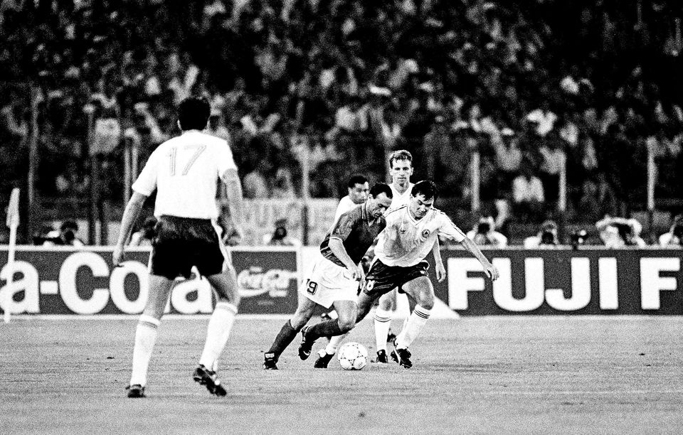 'Toto' Schillaci of Italy in action against Ray Houghton of Ireland during the FIFA World Cup 1990 Quarter-Final match at the Stadio Olimpico in Rome, Italy. Photo by Ray McManus/Sportsfile