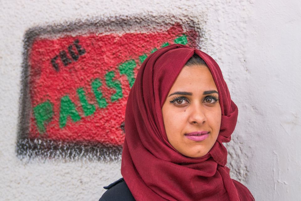 Palestine: Sundus Al-Azzeh, a member of Youth Against Settlements, told John: "The settlers attack us physically, they throw stones, they shout at us and call us names. Our house looks like an island by a sea of soldiers, settlers and a violent atmosphere."