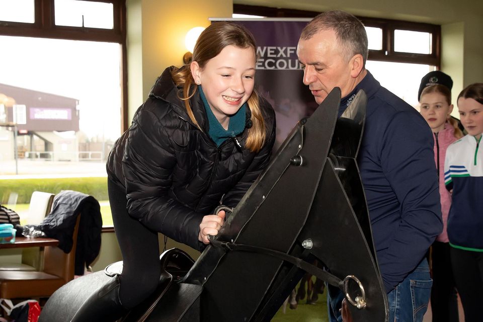 Niamh Denton from Glynn National School trying out the racehorse simulator at the HRI Racing Juniors Educational Day for primary schools at Wexford Racecourse. Photo: Mary Browne