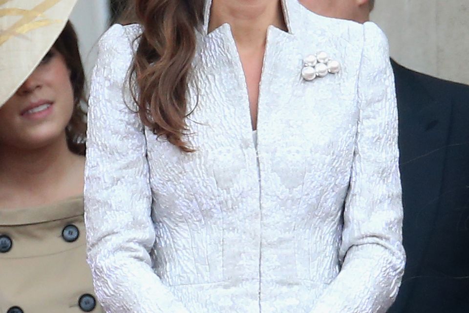 April 2014: Kate stuns in her intricate Alexander McQueen coat dress