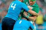 thumbnail: 4 October 2015; Jamie Heaslip, Ireland, is tackled by Leonardo Sarto, left, and Mat?as Ag?ero, Italy. 2015 Rugby World Cup, Pool D, Ireland v Italy. Olympic Stadium, Stratford, London, England. Picture credit: Brendan Moran / SPORTSFILE