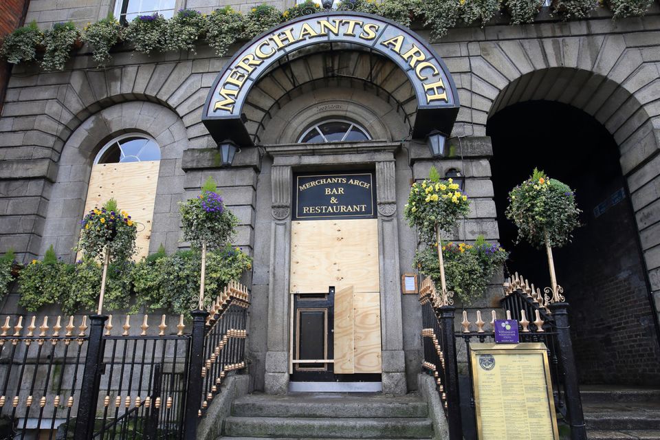 Merchants Arch bar which temporally closed its doors and boarded up, due to the impact of the Coronavirus