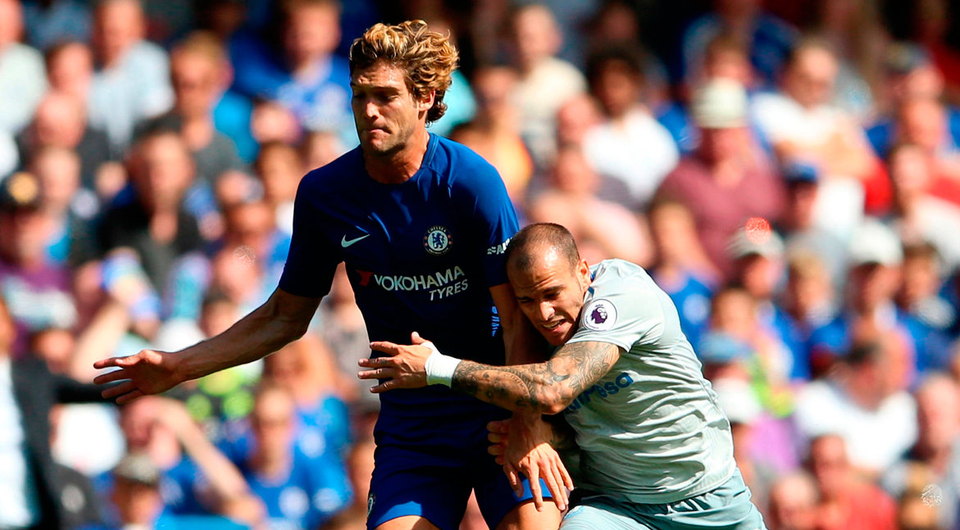 Everton's Sandro Ramirez (right) and Chelsea's Marcos Alonso battle for the ball during the Premier League match at Stamford Bridge. Photo: Scott Heavey/PA