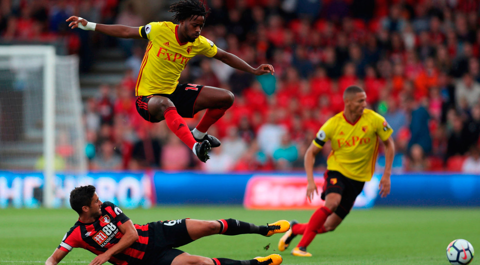 Andrew Surman of AFC Bournemouth tackles Nathaniel Chalobah of Watford   Photo: Getty