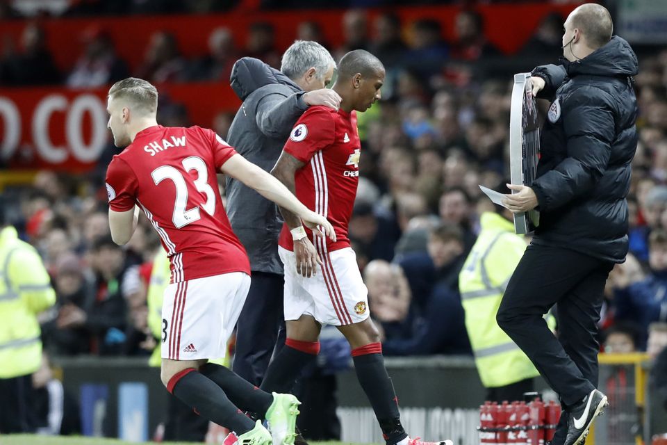 Luke Shaw, left, and Ashley Young, right, are closing in on first-team returns