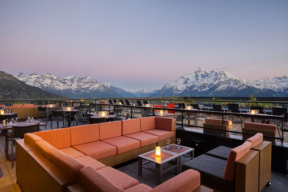 A terrace bar with Alpine view at Club Med La Rosière, France. Photo: Maud Delaflotte