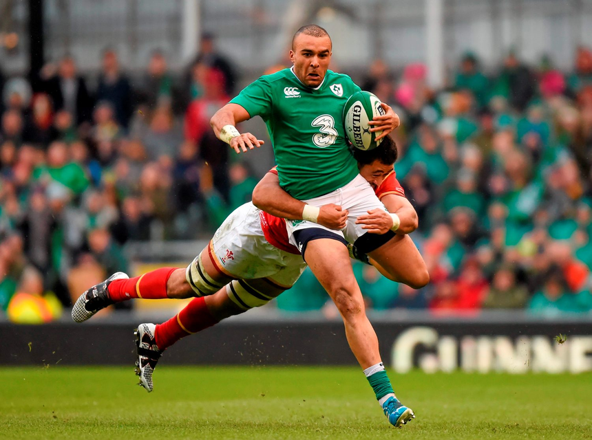 Ireland’s Simon Zebo is tackled by Taulupe Faletau during their draw. Picture credit: Stephen McCarthy / Sportsfile