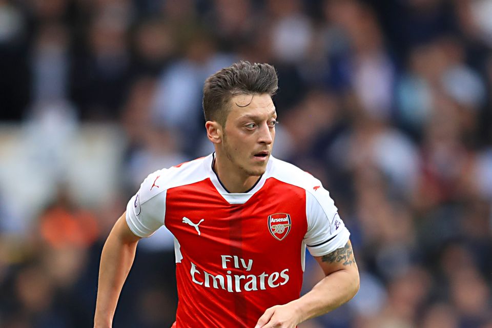 Arsene Wenger has defended Mesut Ozil, pictured, after criticism from former players