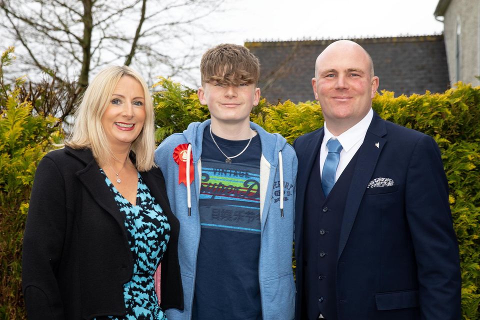 Scoil Mhuire Horeswood confirmation. From left; Bronagh, Evan and Kevin Burke from New Ross. Photo; Mary Browne