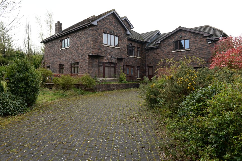 The luxury mansion at Coldwater Lakes in Dublin, which was seized by CAB, is now unkempt and overgrown