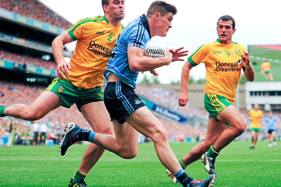 Dublin's Diarmuid Connolly is challenged by Donegal's Éamonn McGee, as Frank McGlynn looks on during the All-Ireland SFC semi-final at Croke Park. Photo: Tomás Greally / SPORTSFILE