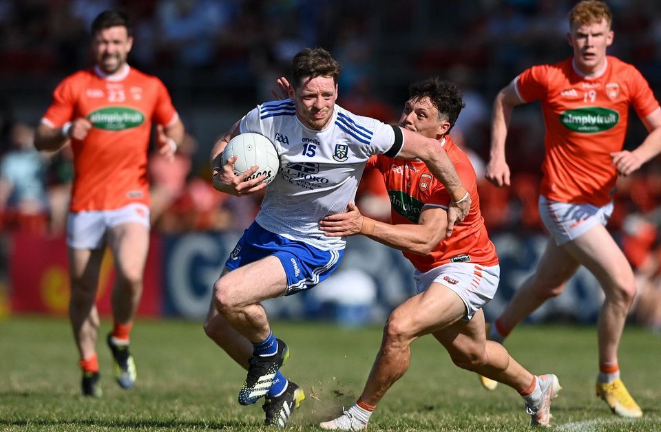 Conor McManus of Monaghan in action against James Morgan of Armagh during the 2021 Ulster SFC semi-final