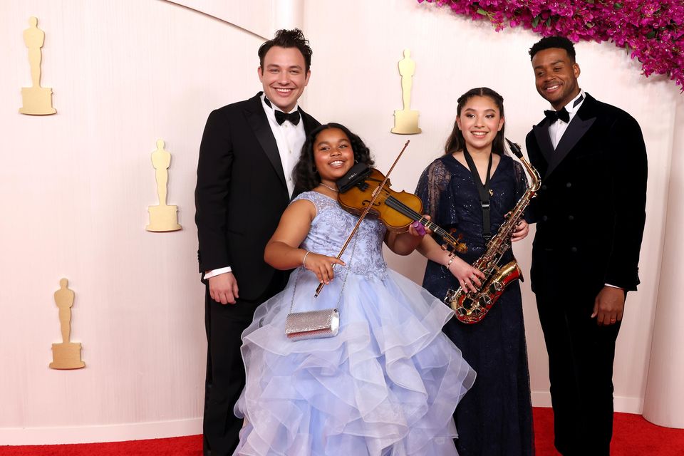 Ben Proudfoot, Porche Brinker, Ismerai Calcaneo and Kris Bowers attend the 96th Annual Academy Awards on March 10, 2024 in Hollywood, California. (Photo by John Shearer/WireImage)