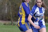 thumbnail: Lisa Nangle of St. Joseph's tries to slow the progress of Aoife Connolly of Aughrim Rangers.