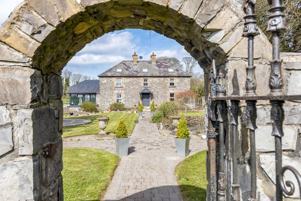 The front of the house as viewed through the archway
