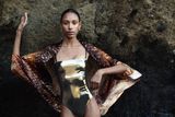 thumbnail: 'Bond' bandeau metallic gold swimsuit, €220, and 'Olivia' cape, €380, Mona Swims