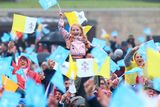 thumbnail: 26/08/2018 A young girl waves a flag as pope Francis visited Knock Shrine as part of the World Meeting of Families. Pic credit; Damien Eagers / INM