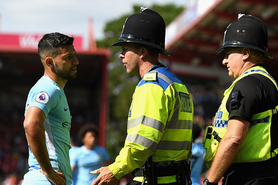 Sergio Aguero of Manchester City argues with a police man during the Premier League match between AFC Bournemouth and Manchester City at Vitality Stadium on August 26, 2017 in Bournemouth, England. (Photo by Mike Hewitt/Getty Images)