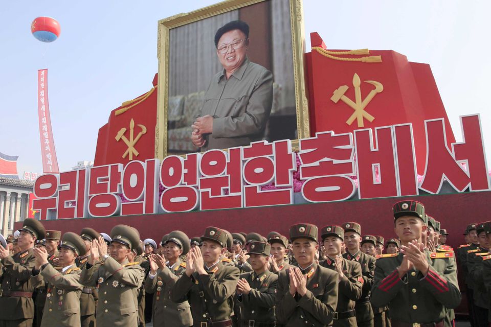 Soldiers applaud during an event marking the 20th anniversary of the election of former North Korean leader Kim Jong Il in Pyongyang. (AP Photo/Jon Chol Jin)