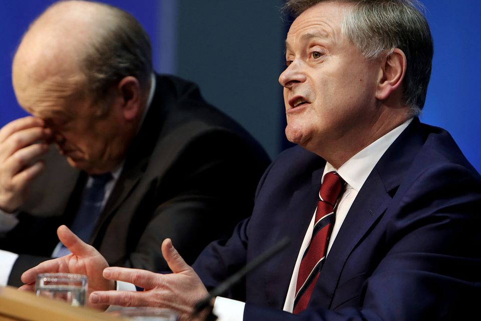 Minister for Finance Michael Noonan and Minister for Public Expenditure Brendan Howlin speaking at the Spring Economic Statement at Government Buildings.