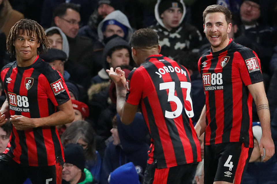 Bournemouth’s Nathan Ake celebrates scoring their third goal with Jordon Ibe at Stamford Bridge last night. Photo: Reuters