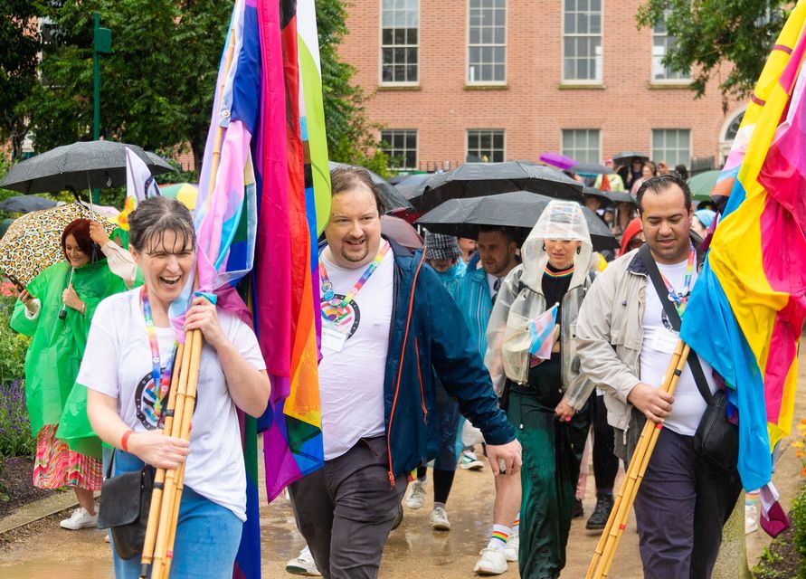 People brave the conditions as they take part in Dublin Pride events. Photo: Evan Treacy/PA Wire