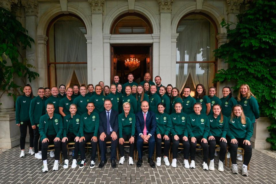 The Ireland soccer squad with manager Vera Pauw (centre), Minister of State Thomas Byrne and Tánaiste Micheál Martin during a World Cup send-off at Farmleigh House, Dublin. Photo: Stephen McCarthy/Sportsfile