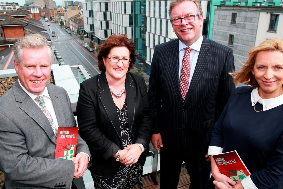 Charlie Weston, Personal Finance Editor Irish Independent with authors Mary Roche, Brian Keegan and Norah Collender at the launch of a new guide to Property Tax, Surviving Local Property Tax at Chartered Accountants House in Dublin