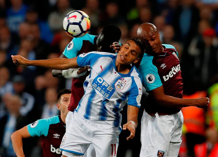 Huddersfield Town’s Abdelhamid Sabiri in action with West Ham United's Andre Ayew and Cheikhou Kouyate. Photo: David Klein/Reuters