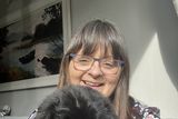 thumbnail: Interior designer Gwen Kenny with one of her dogs