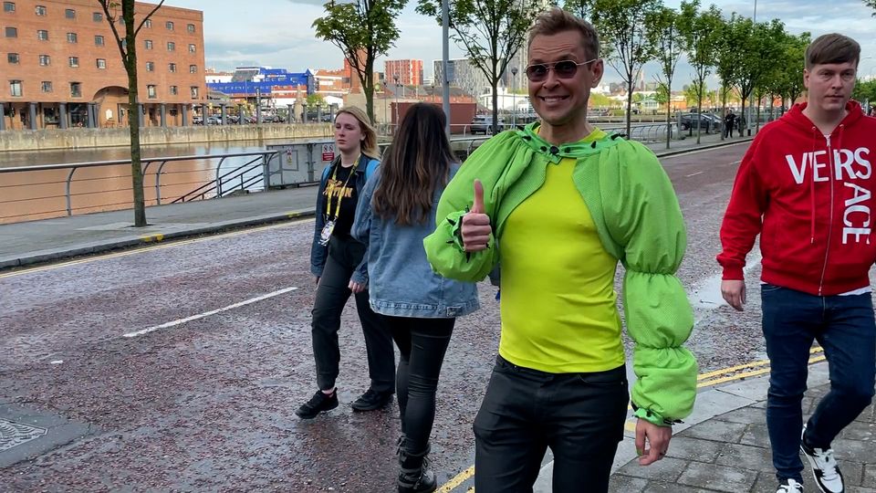 Some fans dressed as Finnish hopeful Kaarija, known for his green bolero-style jacket (Richard McCarthy/PA)