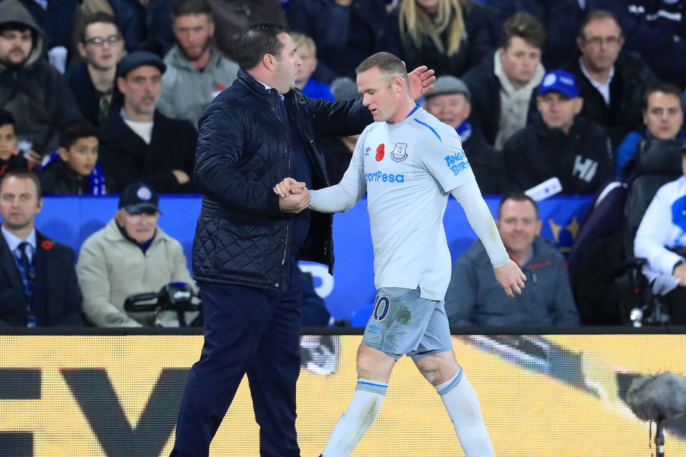 David Unsworth, left, wants senior players like Wayne Rooney, right, to step up against Watford on Sunday