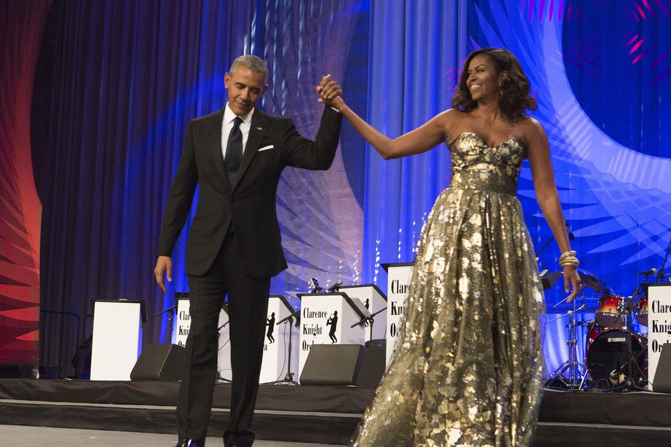 Former first lady Michelle Obama with a Naeem Khan dress during a prize dinner with former president of the United States, Barack Obama. Photo: Getty