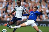 thumbnail: West Bromwich Albion's Saido Berahino (left) battles for the ball with Everton's John Stones