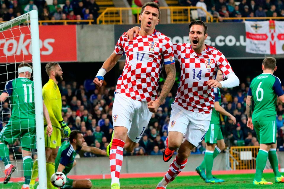 Croatia’s Mario Mandzukic celebrates with Duje Cop