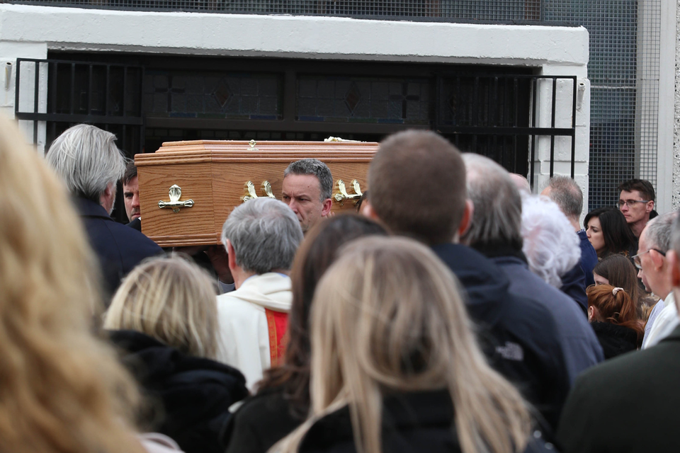 Mourners carry the coffin of Nuala Grant