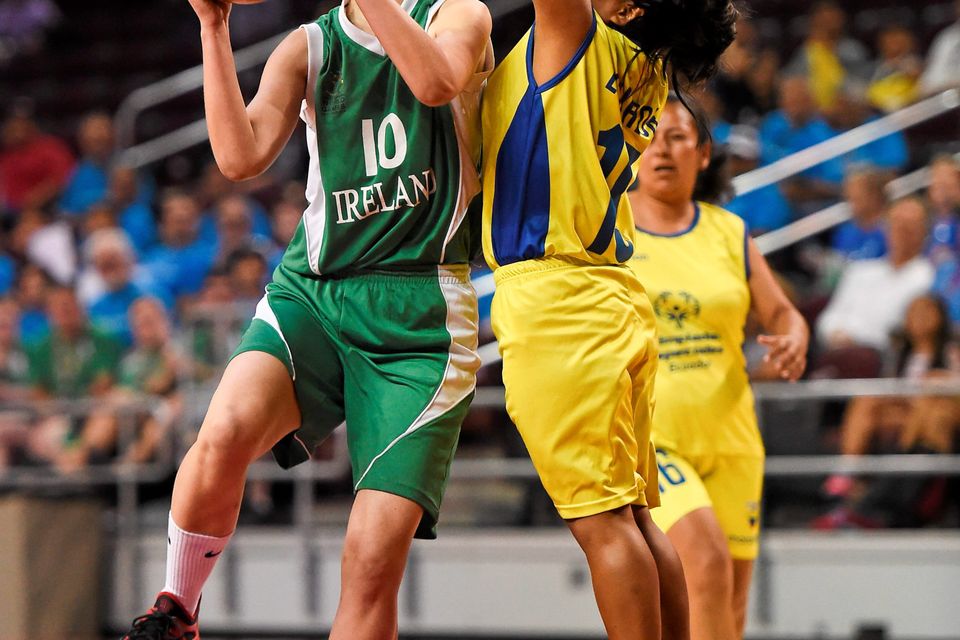 Team Ireland's Sarah Byrne, a member of Palmerstown Wildcats Special Olympics Club, from Clondalkin, Dublin, shoots under pressure from Ana Guadalup Bollo, SO Ecuador, during the SO Ecuador v SO Ireland qualifier basketball game at the Galen Center