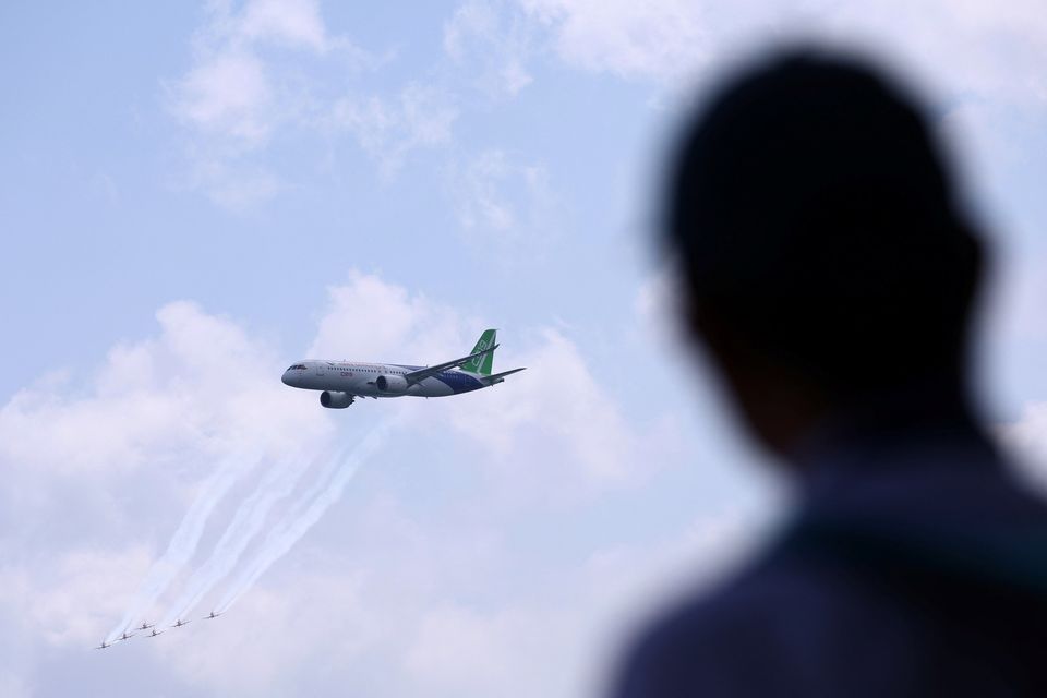 A Comac C919 during an aerial flying display ahead of the Singapore Airshow yesterday. Photo: Reuters