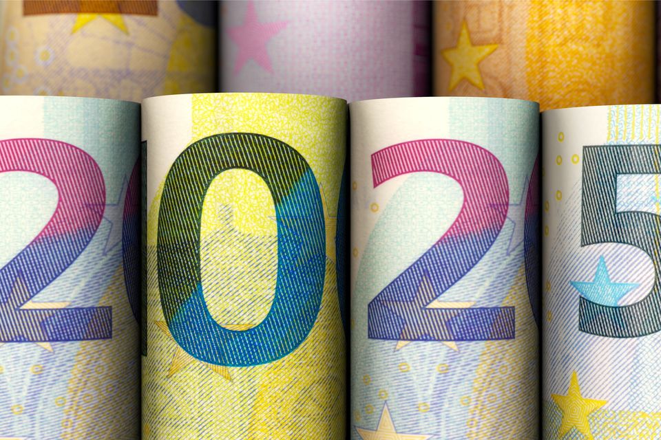 Year 2025 in euro banknotes. People will see an increase in their bank accounts this month