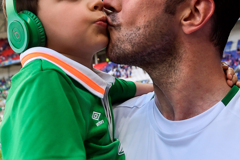John O'Shea of Republic of Ireland with his son. Photo: David Maher/Sportsfile