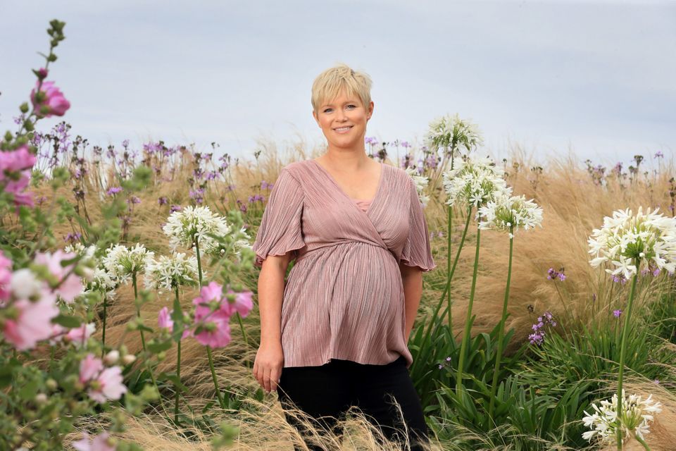 Cecelia Ahern among the blooms at Portmarnock Links Hotel, Dublin. Her new book 'Postscript' is released this Thursday. Photo: Frank McGrath