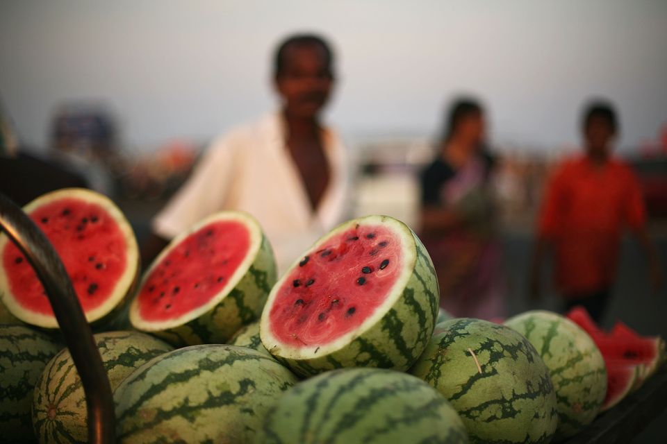 CHENNAI, INDIA - MARCH 20:  Watermelons on a cart are seen at Marina Beach on March 20, 2010 in Chennai, India. The beach which stretches for approximately 12km is listed as one of the longest beaches in the world.  (Photo by Mark Kolbe/Getty Images)