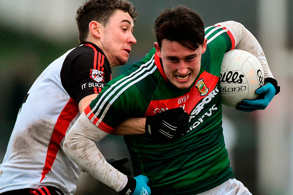 Mayo’s Liam Irwin attempts to brush of Philip Neilan of Sligo IT during the Connacht FBD League clash in Ballina. Photo by David Maher/Sportsfile