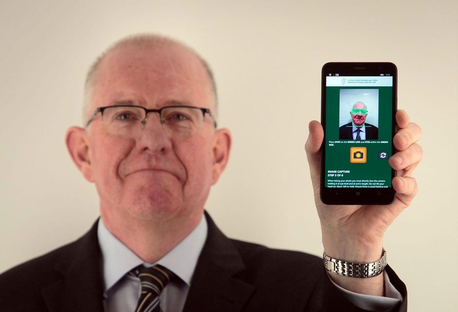 Minister for Foreign Affairs and Trade Charlie Flanagan, TD during the launch of the new Passport Card at the Passport Office,Dublin. Photo: Gareth Chaney Collins