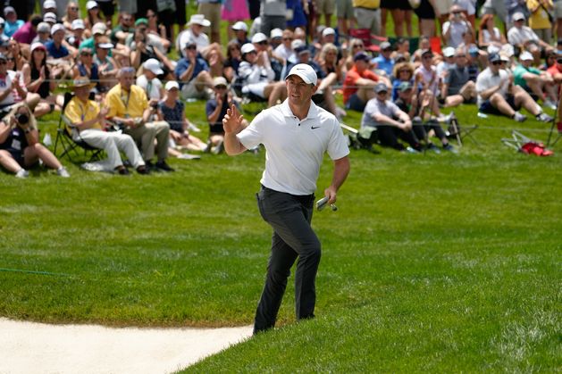 Rory McIlroy digs deep to stay in touch at Memorial but Scottie Scheffler roars into the lead