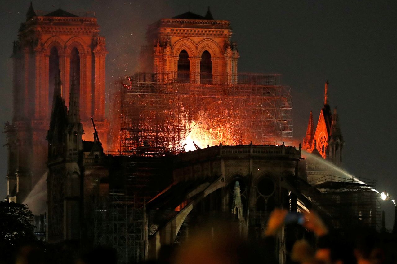 French Tycoons Show Competitive Streak Over Notre Dame Aid - Biz