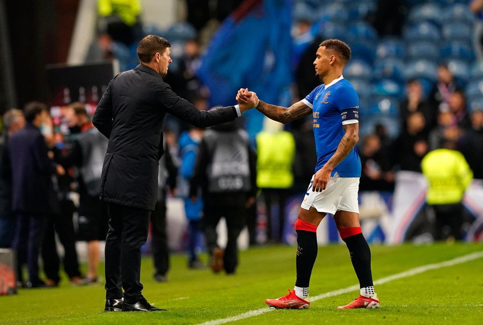 Rangers manager Steven Gerrard shakes hands with James Tavernier after the Europa League Group A defeat to Lyon at Ibrox Stadium, Glasgow