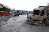 thumbnail: Some of the burned out vans and cars in the yard of the house which was the scene of an eviction in Strokestown last week. 
Photo Brian Farrell