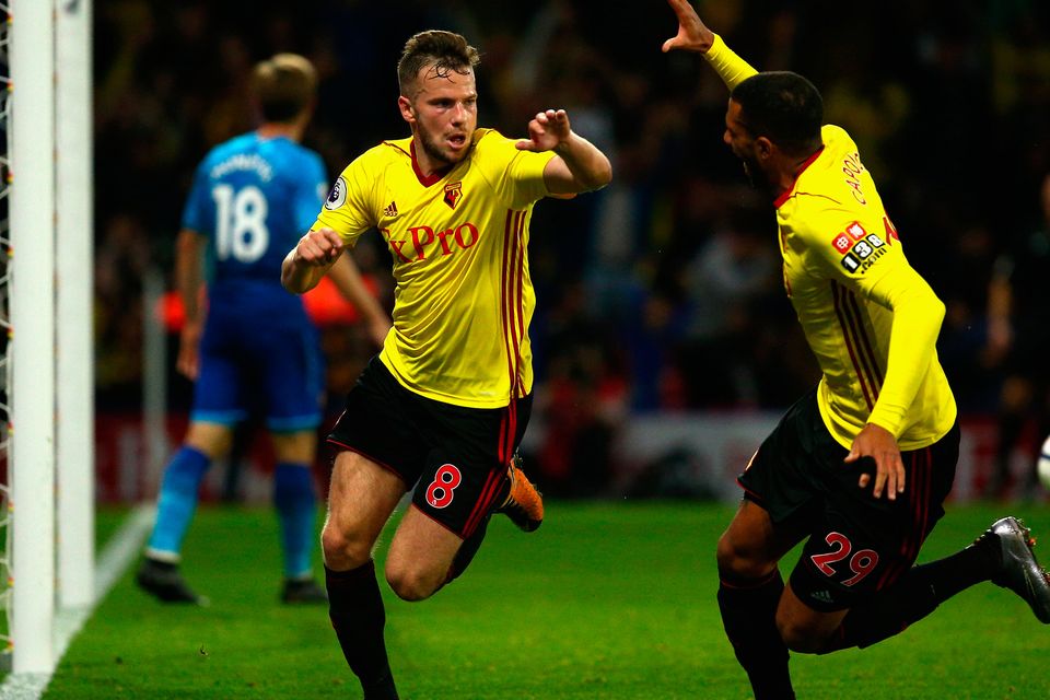 Tom Cleverley of Watford (8) celebrates as he scores their second goal with Etienne Capoue. Photo: Getty Images