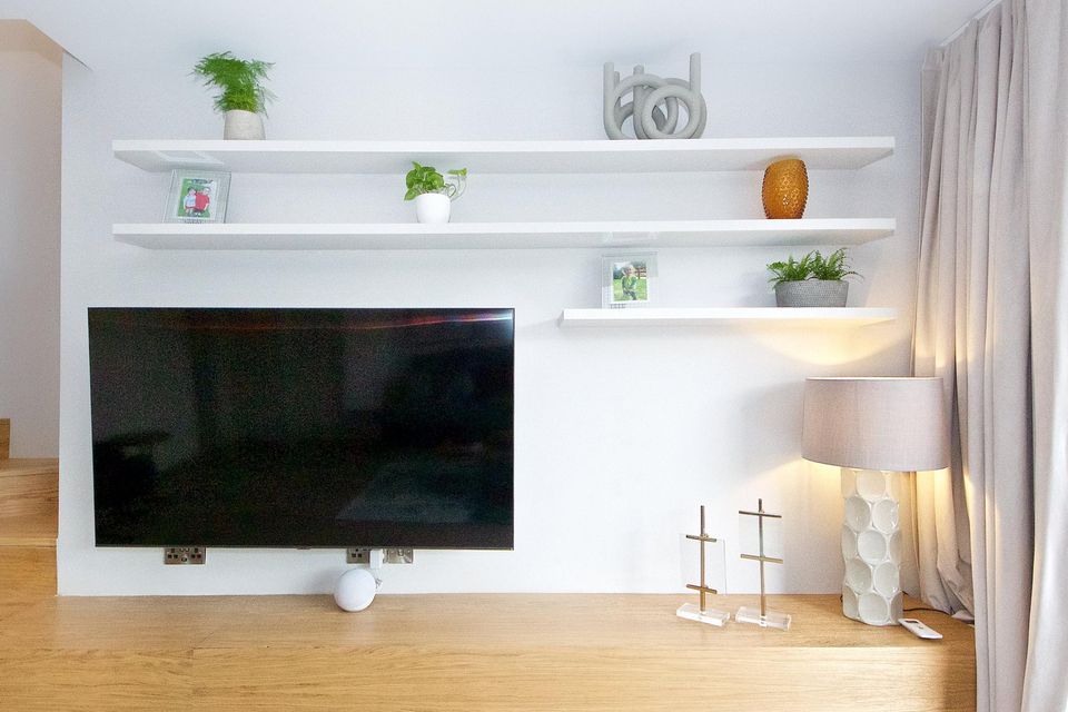 The 65" TV in Adams' hang out space.
